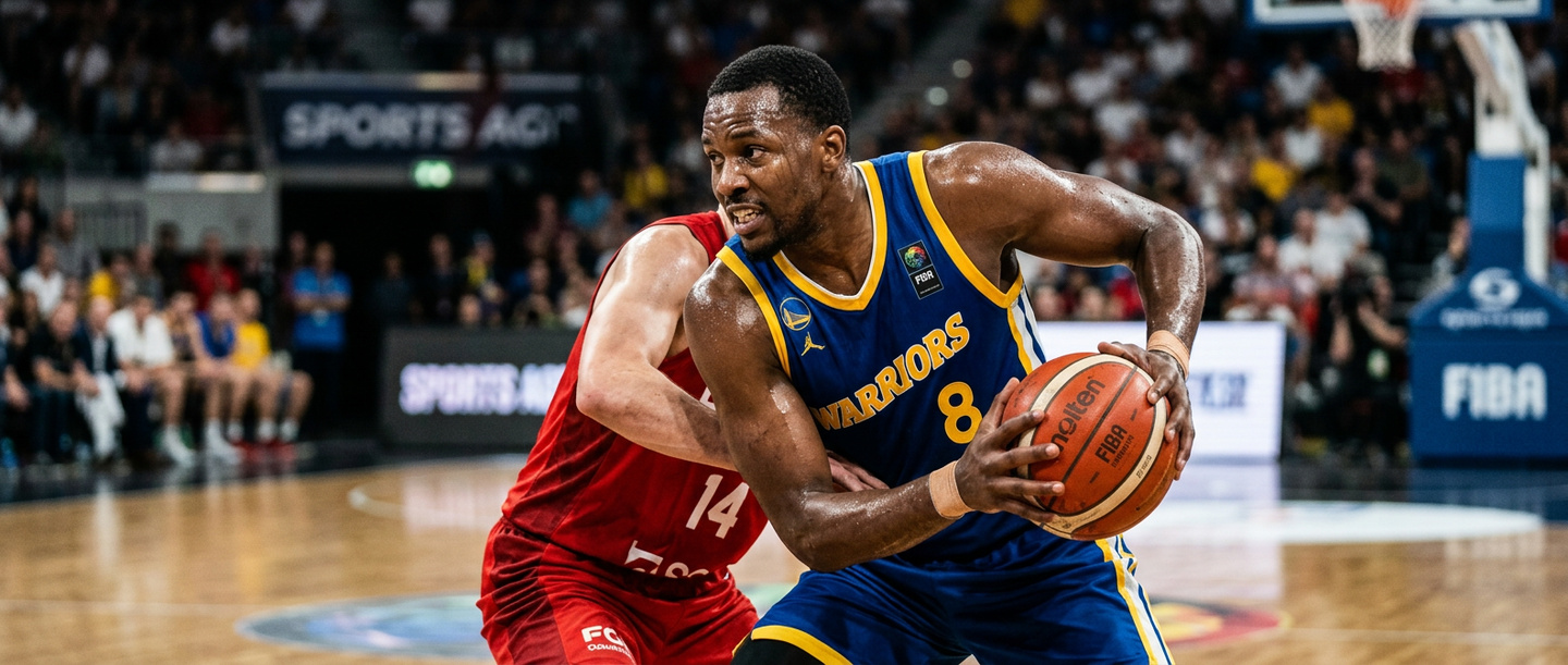 Basketball players in action on a lit court